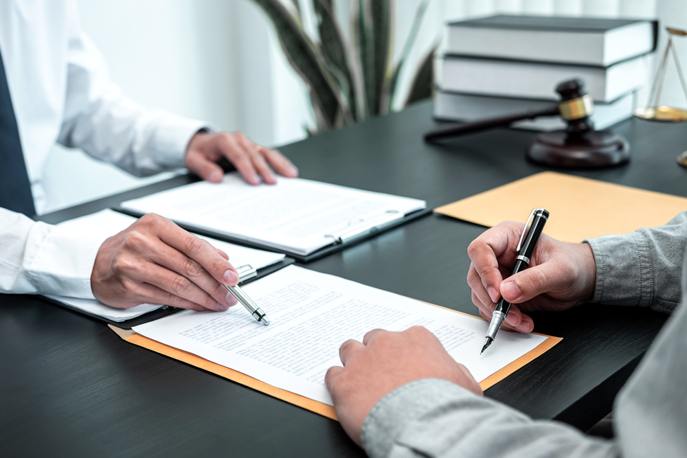 Photo of a Lawyer with a Client