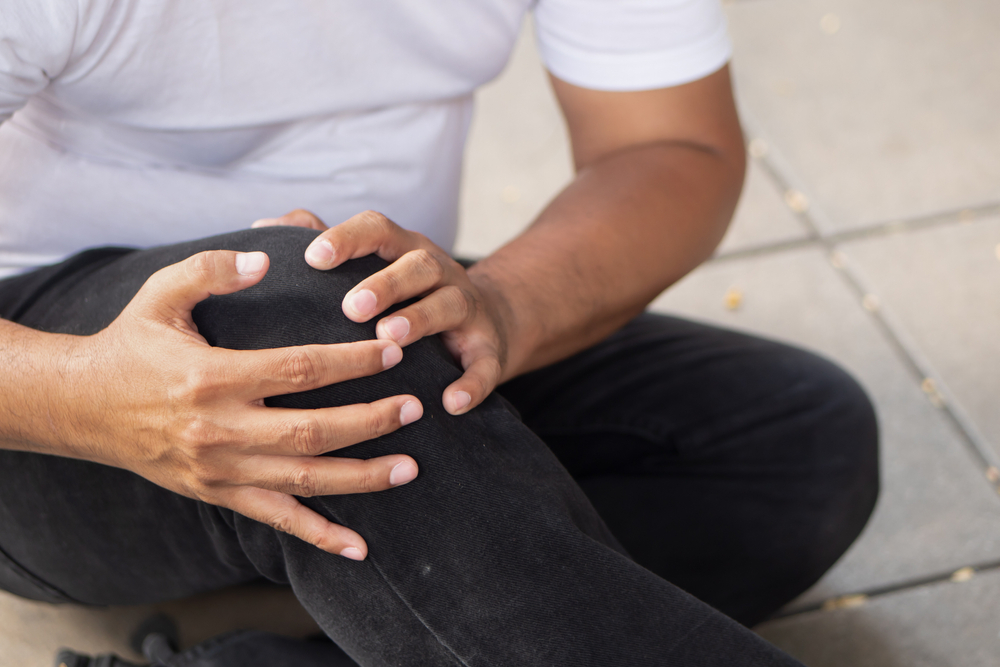 Photo of a Man with Injured Knee