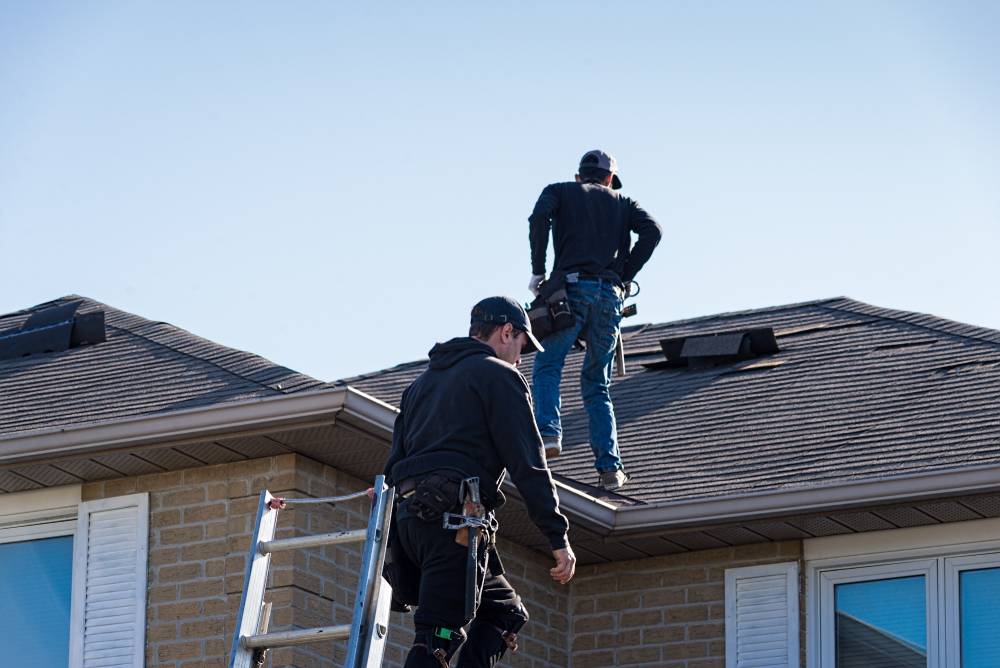 Photo of people on roof