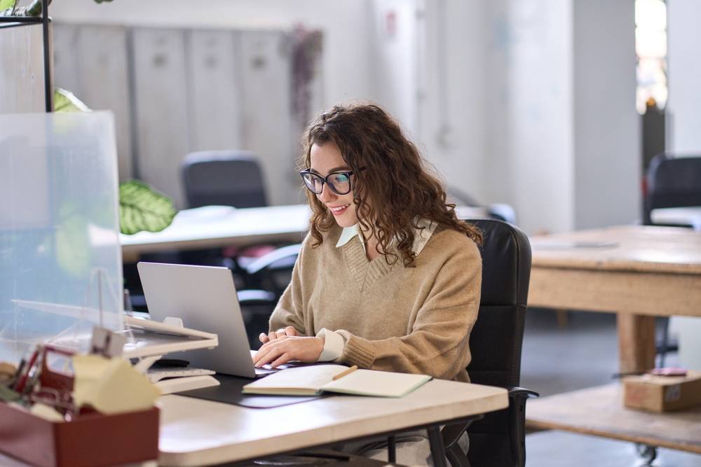 Photo of person at desk