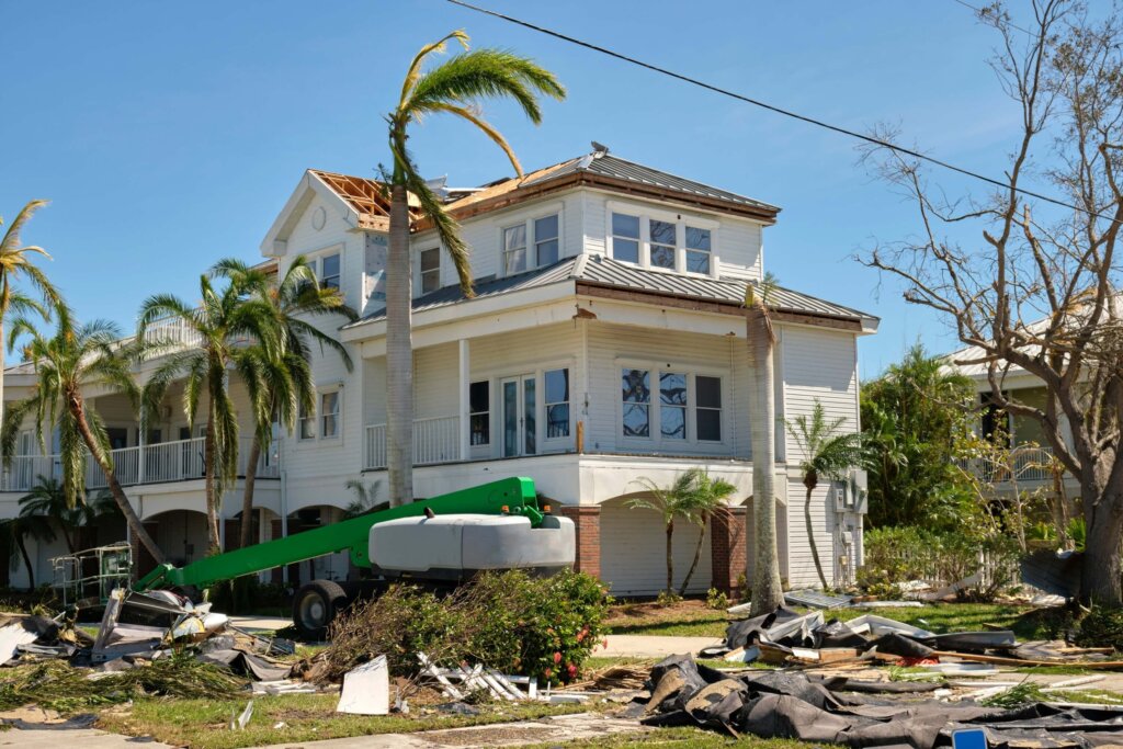 Expensive house in residential area destroyed by Hurricane Ian. Consequences of natural disasters